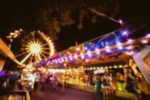 Children's Carousel at a carnival in the evening and nigh