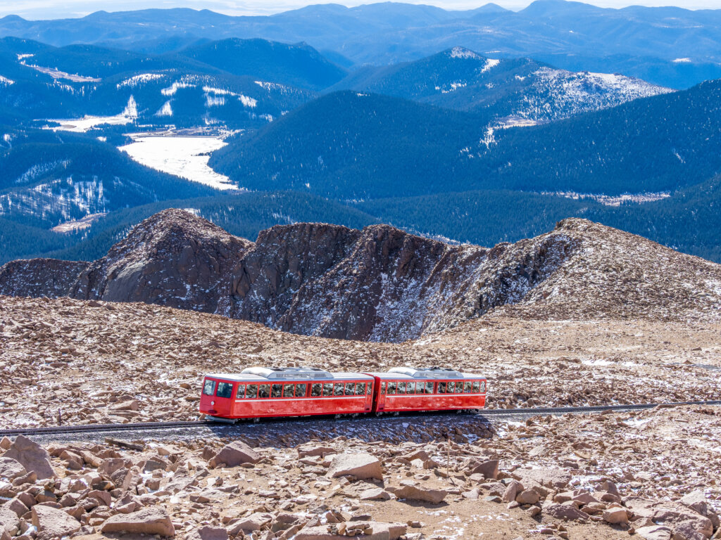 Cog train climbing on top of Pikes Peak in Colorado