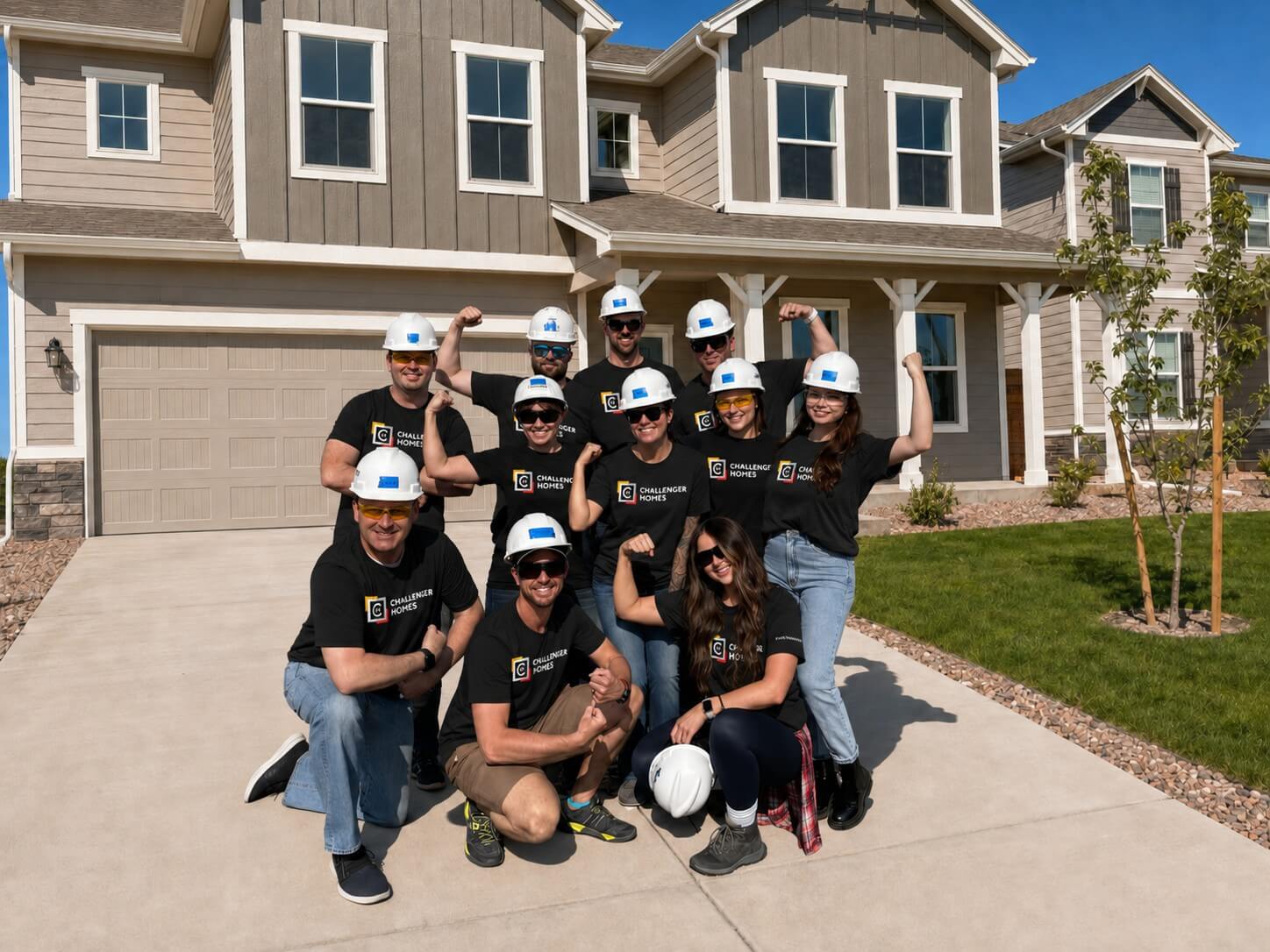 Challenger Homes team gathered outside a home