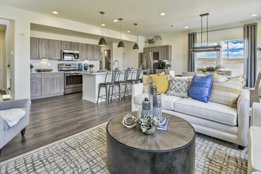 Challenger Homes model home kitchen and living room interior 